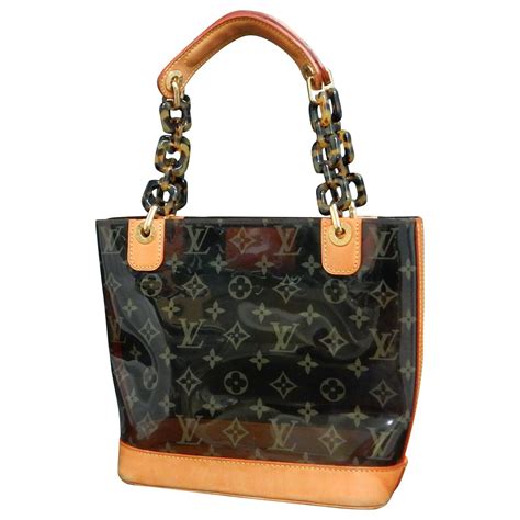 louis vuitton transparent shoulder purse.